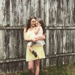 Employee Spotlight: Emily Souza with child